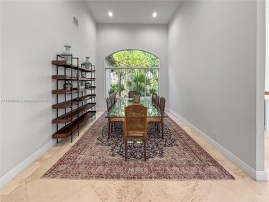 Welcome Home! This spectacular residence, boasting a lake and on Weston Hills Country Club in Florida - for sale on GolfHomes.com, golf home, golf lot