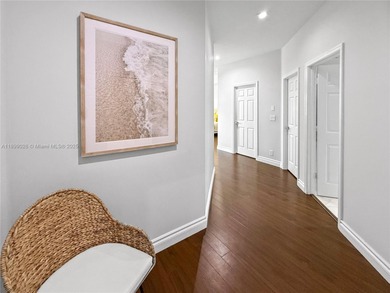 Welcome Home! This spectacular residence, boasting a lake and on Weston Hills Country Club in Florida - for sale on GolfHomes.com, golf home, golf lot