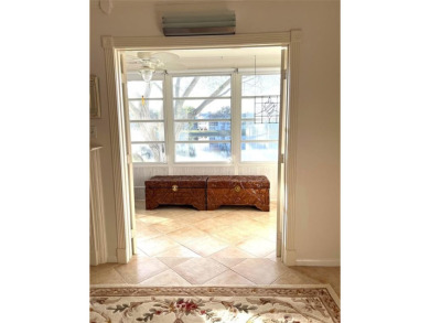 RENOVATED FRESH PAINT EXPANSIVE WATER VIEW WALK TO HOUSES OF on Hillsboro Pines Golf in Florida - for sale on GolfHomes.com, golf home, golf lot