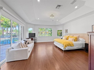 Welcome Home! This spectacular residence, boasting a lake and on Weston Hills Country Club in Florida - for sale on GolfHomes.com, golf home, golf lot