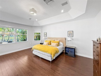 Welcome Home! This spectacular residence, boasting a lake and on Weston Hills Country Club in Florida - for sale on GolfHomes.com, golf home, golf lot