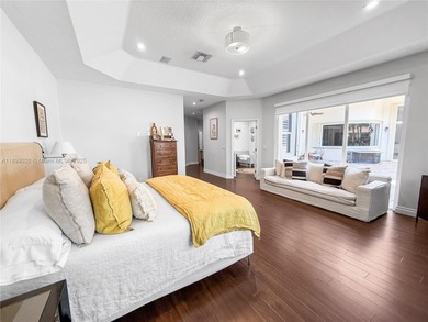 Welcome Home! This spectacular residence, boasting a lake and on Weston Hills Country Club in Florida - for sale on GolfHomes.com, golf home, golf lot