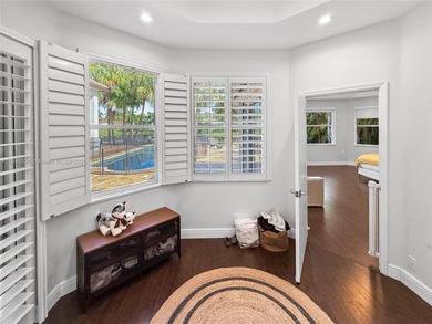 Welcome Home! This spectacular residence, boasting a lake and on Weston Hills Country Club in Florida - for sale on GolfHomes.com, golf home, golf lot