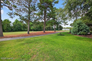 Elegance meets ease with coastal living on the golf course! This on North Shore Country Club in North Carolina - for sale on GolfHomes.com, golf home, golf lot