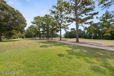 Elegance meets ease with coastal living on the golf course! This on North Shore Country Club in North Carolina - for sale on GolfHomes.com, golf home, golf lot