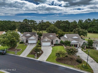 Elegance meets ease with coastal living on the golf course! This on North Shore Country Club in North Carolina - for sale on GolfHomes.com, golf home, golf lot