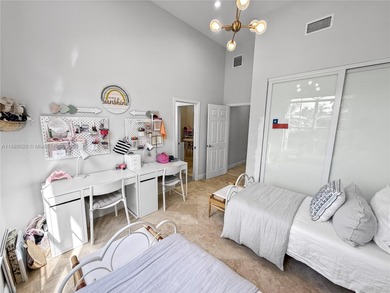 Welcome Home! This spectacular residence, boasting a lake and on Weston Hills Country Club in Florida - for sale on GolfHomes.com, golf home, golf lot