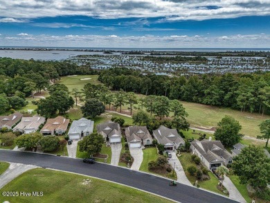 Elegance meets ease with coastal living on the golf course! This on North Shore Country Club in North Carolina - for sale on GolfHomes.com, golf home, golf lot