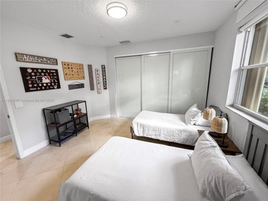 Welcome Home! This spectacular residence, boasting a lake and on Weston Hills Country Club in Florida - for sale on GolfHomes.com, golf home, golf lot