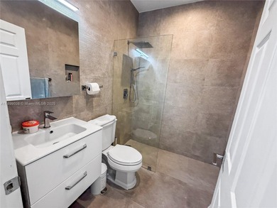 Welcome Home! This spectacular residence, boasting a lake and on Weston Hills Country Club in Florida - for sale on GolfHomes.com, golf home, golf lot