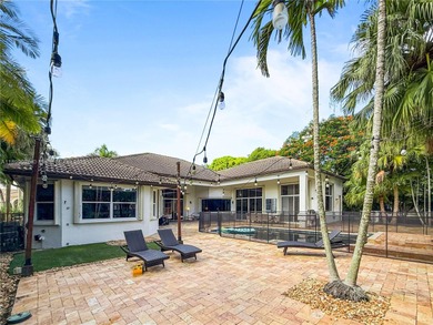 Welcome Home! This spectacular residence, boasting a lake and on Weston Hills Country Club in Florida - for sale on GolfHomes.com, golf home, golf lot