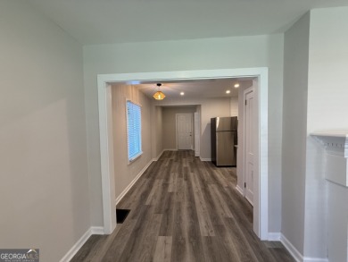 Discover modern comfort in this beautifully renovated home on John A. White Golf Course in Georgia - for sale on GolfHomes.com, golf home, golf lot