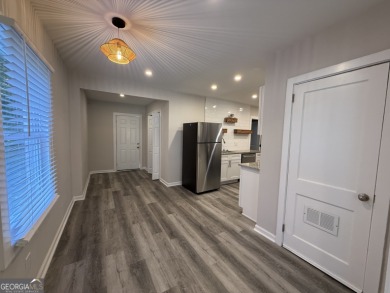 Discover modern comfort in this beautifully renovated home on John A. White Golf Course in Georgia - for sale on GolfHomes.com, golf home, golf lot