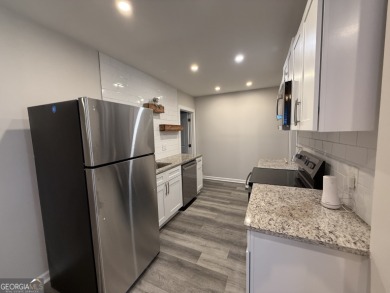 Discover modern comfort in this beautifully renovated home on John A. White Golf Course in Georgia - for sale on GolfHomes.com, golf home, golf lot