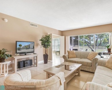 Discover your dream home in Palm Aire Country Club! This on Palm-Aire Country Club and Resort - Palms in Florida - for sale on GolfHomes.com, golf home, golf lot