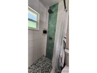 Seller is now offering a New Roof to be installed before closing on Plantation Inn and Golf Resort  in Florida - for sale on GolfHomes.com, golf home, golf lot