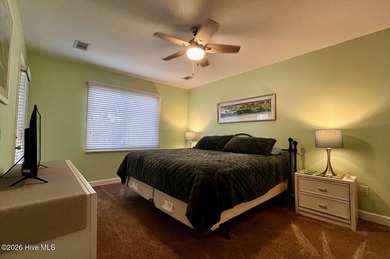 Welcome to this 2nd floor condo in the Oyster Bay community on Oyster Bay Golf Links in North Carolina - for sale on GolfHomes.com, golf home, golf lot