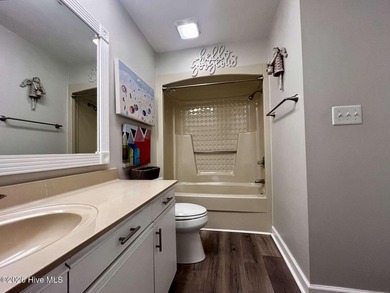 Welcome to this 2nd floor condo in the Oyster Bay community on Oyster Bay Golf Links in North Carolina - for sale on GolfHomes.com, golf home, golf lot