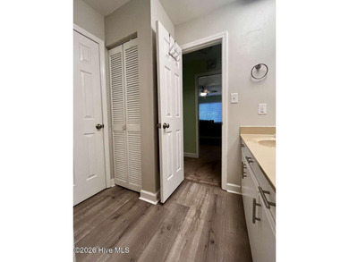 Welcome to this 2nd floor condo in the Oyster Bay community on Oyster Bay Golf Links in North Carolina - for sale on GolfHomes.com, golf home, golf lot