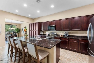 Spacious Villa with rich wood cabinet finishes and granite on Tuscany Falls At Pebble Creek in Arizona - for sale on GolfHomes.com, golf home, golf lot