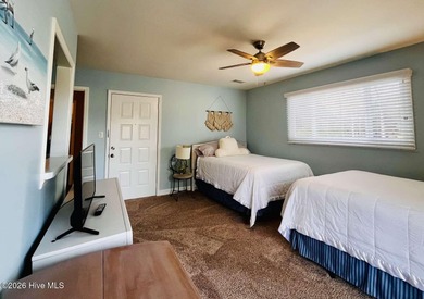 Welcome to this 2nd floor condo in the Oyster Bay community on Oyster Bay Golf Links in North Carolina - for sale on GolfHomes.com, golf home, golf lot