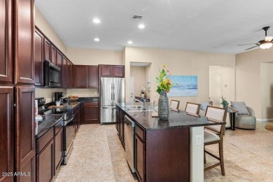 Spacious Villa with rich wood cabinet finishes and granite on Tuscany Falls At Pebble Creek in Arizona - for sale on GolfHomes.com, golf home, golf lot