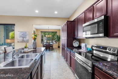 Spacious Villa with rich wood cabinet finishes and granite on Tuscany Falls At Pebble Creek in Arizona - for sale on GolfHomes.com, golf home, golf lot