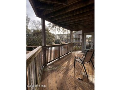 Welcome to this 2nd floor condo in the Oyster Bay community on Oyster Bay Golf Links in North Carolina - for sale on GolfHomes.com, golf home, golf lot