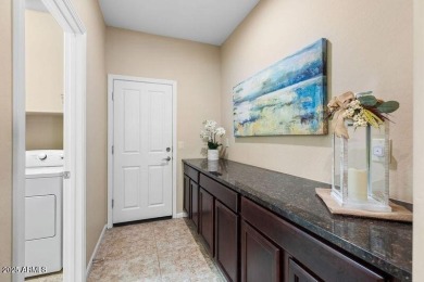 Spacious Villa with rich wood cabinet finishes and granite on Tuscany Falls At Pebble Creek in Arizona - for sale on GolfHomes.com, golf home, golf lot