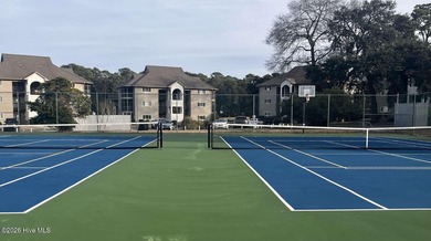 Welcome to this 2nd floor condo in the Oyster Bay community on Oyster Bay Golf Links in North Carolina - for sale on GolfHomes.com, golf home, golf lot