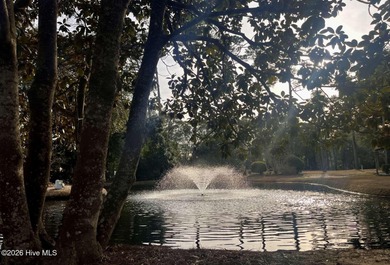 Welcome to this 2nd floor condo in the Oyster Bay community on Oyster Bay Golf Links in North Carolina - for sale on GolfHomes.com, golf home, golf lot