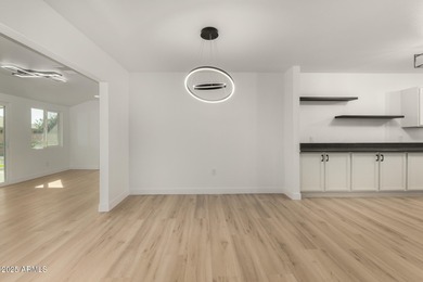 Beautifully remodeled 3-bedroom, 2-bath home in Sun City. Recent on Sun City Lakes West and East in Arizona - for sale on GolfHomes.com, golf home, golf lot