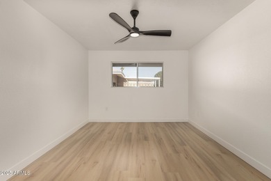 Beautifully remodeled 3-bedroom, 2-bath home in Sun City. Recent on Sun City Lakes West and East in Arizona - for sale on GolfHomes.com, golf home, golf lot