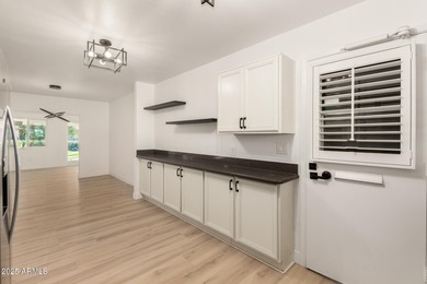 Beautifully remodeled 3-bedroom, 2-bath home in Sun City. Recent on Sun City Lakes West and East in Arizona - for sale on GolfHomes.com, golf home, golf lot