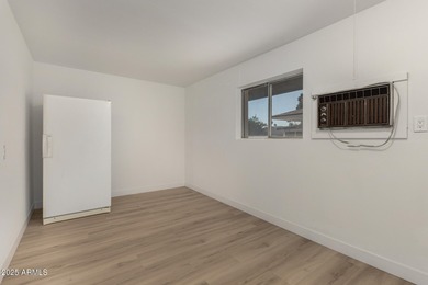 Beautifully remodeled 3-bedroom, 2-bath home in Sun City. Recent on Sun City Lakes West and East in Arizona - for sale on GolfHomes.com, golf home, golf lot