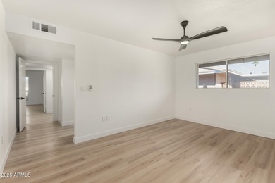 Beautifully remodeled 3-bedroom, 2-bath home in Sun City. Recent on Sun City Lakes West and East in Arizona - for sale on GolfHomes.com, golf home, golf lot