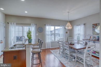 Looking for an end unit with a low-maintenance deck and an on Plantation Lakes Golf and Country Club in Delaware - for sale on GolfHomes.com, golf home, golf lot
