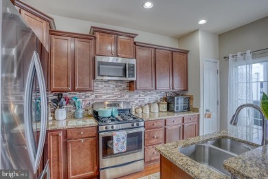 Looking for an end unit with a low-maintenance deck and an on Plantation Lakes Golf and Country Club in Delaware - for sale on GolfHomes.com, golf home, golf lot