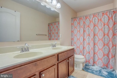 Looking for an end unit with a low-maintenance deck and an on Plantation Lakes Golf and Country Club in Delaware - for sale on GolfHomes.com, golf home, golf lot