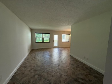 Totally updated first floor condo in active 55+ community with on Vero Beach South Golf Course in Florida - for sale on GolfHomes.com, golf home, golf lot
