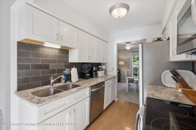 Take a look at this updated 3 bed 1 1/2 bath end unit condo in on Lake O The Hills Golf Course in Michigan - for sale on GolfHomes.com, golf home, golf lot