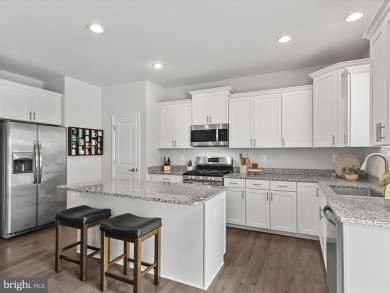 Introducing 36067 Auburn Way, a lovely townhome in the on Plantation Lakes Golf and Country Club in Delaware - for sale on GolfHomes.com, golf home, golf lot