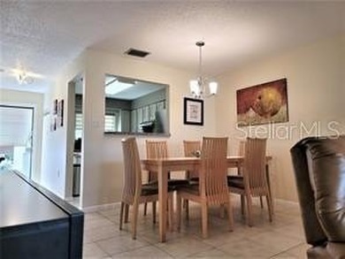 This sunny 2nd Floor condo turnkey furnished, has been remodeled on The Meadows Golf and Country Club in Florida - for sale on GolfHomes.com, golf home, golf lot