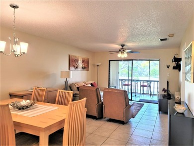 This sunny 2nd Floor condo turnkey furnished, has been remodeled on The Meadows Golf and Country Club in Florida - for sale on GolfHomes.com, golf home, golf lot