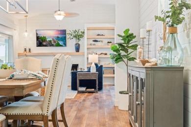 Discover luxury coastal living at its finest in this fully on Apollo Beach Golf and Sea Club in Florida - for sale on GolfHomes.com, golf home, golf lot