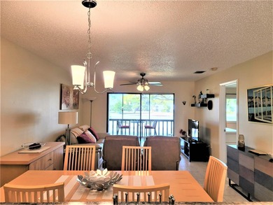 This sunny 2nd Floor condo turnkey furnished, has been remodeled on The Meadows Golf and Country Club in Florida - for sale on GolfHomes.com, golf home, golf lot