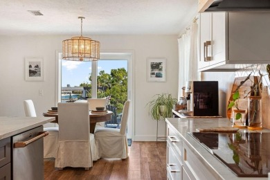 Discover luxury coastal living at its finest in this fully on Apollo Beach Golf and Sea Club in Florida - for sale on GolfHomes.com, golf home, golf lot