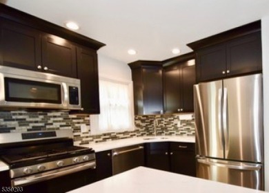 IMPRESSSIVE updated 3 bedroom, 1.1 bath BEAUTIFUL split situated on Baltusrol Golf Club in New Jersey - for sale on GolfHomes.com, golf home, golf lot
