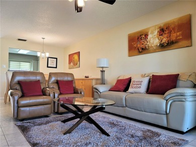 This sunny 2nd Floor condo turnkey furnished, has been remodeled on The Meadows Golf and Country Club in Florida - for sale on GolfHomes.com, golf home, golf lot