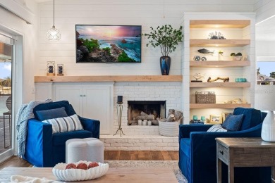 Discover luxury coastal living at its finest in this fully on Apollo Beach Golf and Sea Club in Florida - for sale on GolfHomes.com, golf home, golf lot
